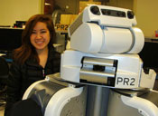 Eleanor with PR2 robot at Willow Garage (2013)