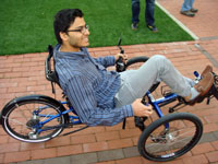 Angel pedals a handbike at the VA Assistive Technology Lab (2014)